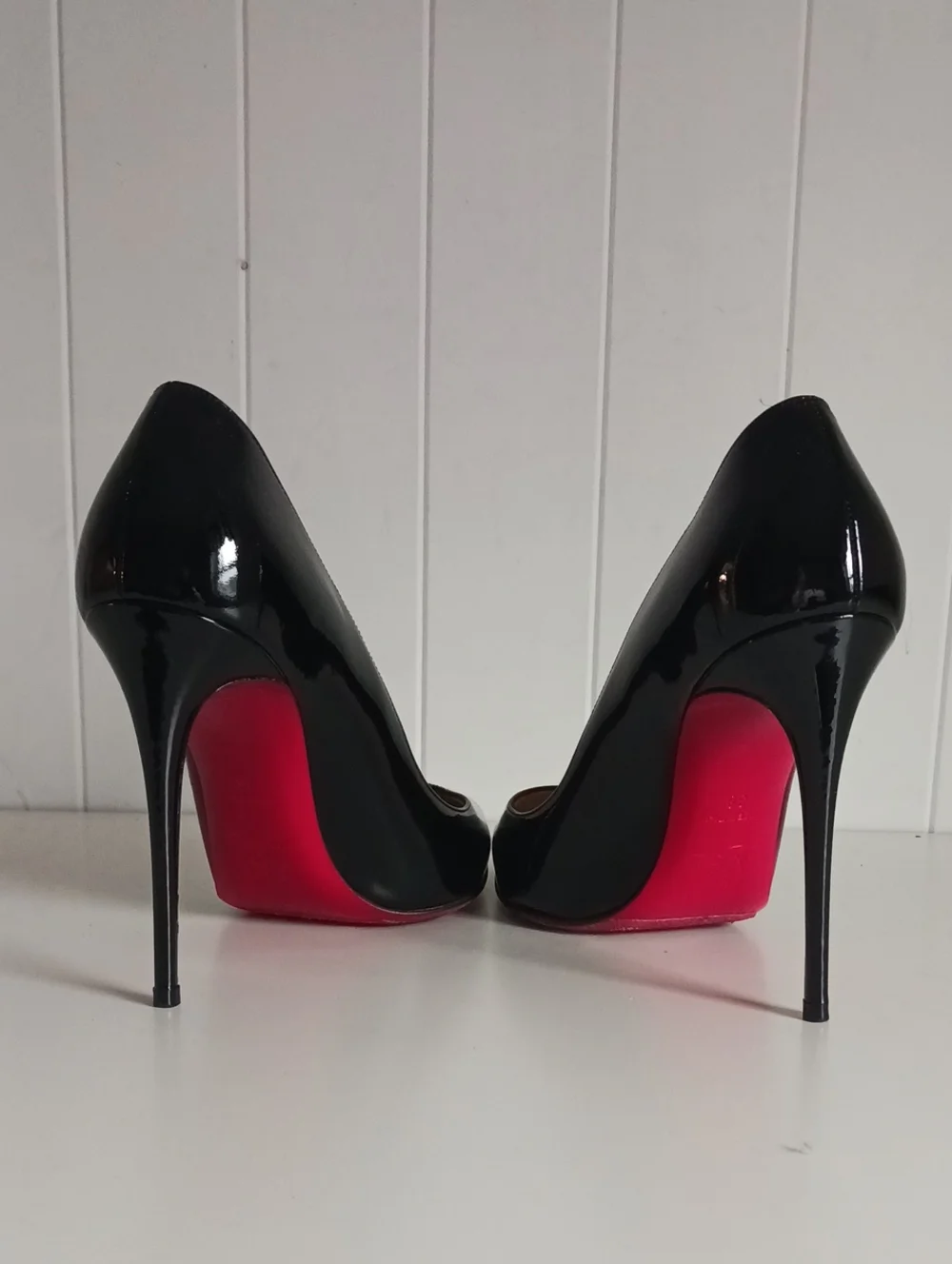 CHRISTIAN LOUBOUTIN PIGALLE FOLLIES PATENT LEATHER PUMPS